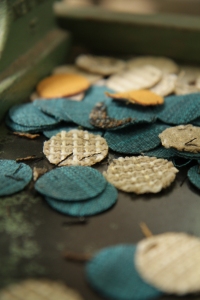Buttons being made in Thrive's Factory.